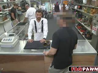 Charming gay blows a penis in public pawn shop